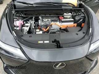 2023 Lexus RZ 450e Premium z VIN JTJAAAAB9PA019798, wystawiony jako Copart lot #67931974 z przebiegiem 3947 mil mil oraz Szkody całkowita. Historia ofert i sprzedaży dostępna na DreamBid. Obrazek 12.