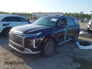 2024 Hyundai Palisade Calligraphy z VIN KM8R74GE2RU677273, wystawiony jako IAAI lot #41989335 z przebiegiem 9 200 mil mil oraz . Historia ofert i sprzedaży dostępna na DreamBid. Obrazek 2.
