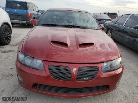 2006 Pontiac GTO with VIN 6G2VX12U66L568064, listed as a Copart auction lot 76411764 with 109,753 mi miles and Salvage Title. Bid and sale history available at carsss.com. Image 5.
