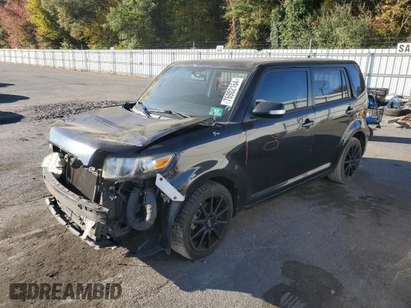 2012 Scion xB with VIN JTLZE4FE8CJ029414, listed as a Copart auction lot 76902164 with 155,803 mi miles and Salvage Title. Bid and sale history available at carsss.com. Image 1.