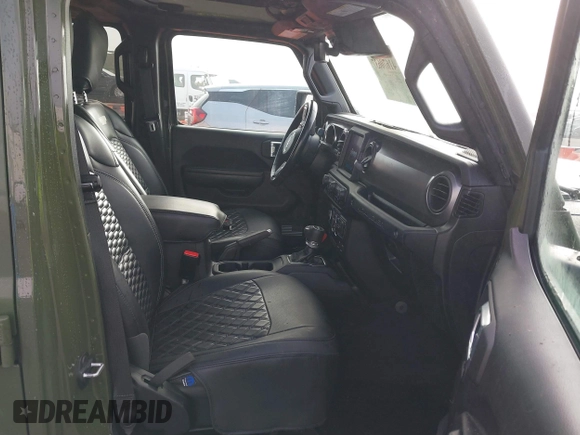 2021 Jeep Wrangler Unlimited Willys with VIN 1C4HJXDM1MW812674, listed as a IAAI auction lot 41670637 with 59,241 mi miles and . Bid and sale history available at DreamBid. Image 5.