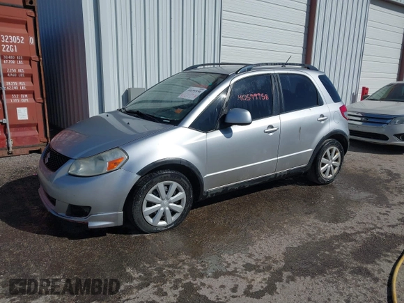 2010 Suzuki SX4 with VIN JS2YA5A30A6301412, listed as a IAAI auction lot 40599958 with 123,177 mi miles. Bid and sale history available at carsss.com. Image 2.
