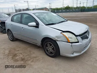2012 Nissan Sentra S z VIN 3N1AB6APXCL707811, wystawiony jako IAAI lot #42787604 z przebiegiem 199 066 mil mil oraz . Historia ofert i sprzedaży dostępna na DreamBid. Obrazek 1.