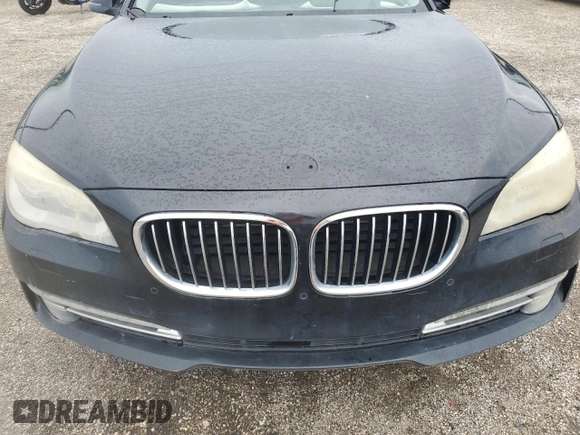 2013 BMW 7 Series 750i xDrive z VIN WBAYB6C53DC997908, wystawiony jako Copart lot #74759314 z przebiegiem Nie podano mil oraz Szkoda całkowita • Salvage title. Historia ofert i sprzedaży dostępna na DreamBid. Obrazek 11.