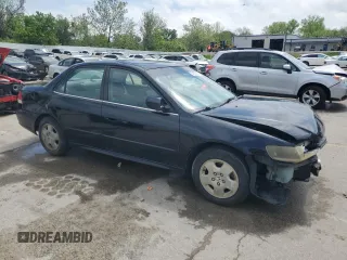 2002 Honda Accord EX z VIN 1HGCG16582A057594, wystawiony jako Copart lot #54874665 z przebiegiem 173 709 mil mil oraz Szkoda całkowita • Salvage title. Historia ofert i sprzedaży dostępna na DreamBid. Obrazek 4.