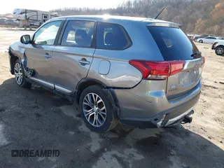 2016 Mitsubishi Outlander SE with VIN JA4AZ3A30GZ039451, listed as a IAAI auction lot 41839444 with 151,357 mi miles and . Bid and sale history available at DreamBid. Image 3.