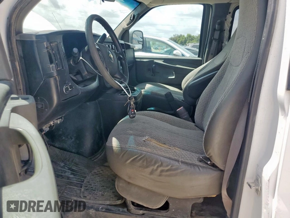 2014 Chevrolet Express Passenger LT с VIN 1GAZG1FGXE1106737, выставлен на аукционе Copart как лот 62956805 с пробегом 267 908 миль миль и Чистый • Clean title. История ставок и продаж доступна на DreamBid. Изображение 7.