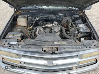 1999 Chevrolet Suburban with VIN 3GNEC16R7XG141671, listed as a Copart auction lot 77784174 with 207,234 mi miles and Salvage Title. Bid and sale history available at carsss.com. Image 13.