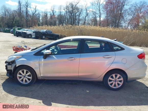 2013 Ford Fiesta SE with VIN 3FADP4BJ2DM173456, listed as a IAAI auction lot 41785902 with 87,004 mi miles. Bid and sale history available at carsss.com. Image 15.