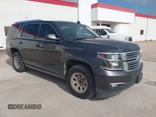 2018 Chevrolet Tahoe LS with VIN 1GNSCAKCXJR127730, listed as a IAAI auction lot 42187079 with 123,465 mi miles and . Bid and sale history available at DreamBid. Image 1.