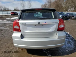 2010 Dodge Caliber SXT z VIN 1B3CB4HA4AD597158, wystawiony jako Copart lot #51757335 z przebiegiem 128 791 mil mil oraz Czysty tytuł • Clean title. Historia ofert i sprzedaży dostępna na DreamBid. Obrazek 6.
