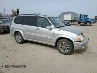 2005 Suzuki XL7 LX z VIN JS3TY92V654102195, wystawiony jako Copart lot #45678475 z przebiegiem 195 560 mil mil oraz Szkoda całkowita • Salvage title. Historia ofert i sprzedaży dostępna na DreamBid. Obrazek 4.
