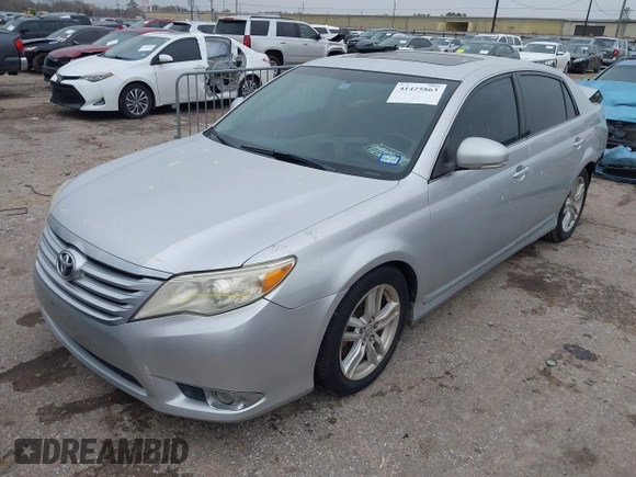 2012 Toyota Avalon z VIN 4T1BK3DB7CU453850, wystawiony jako IAAI lot #41425863 z przebiegiem 142 623 mil mil oraz . Historia ofert i sprzedaży dostępna na DreamBid. Obrazek 17.