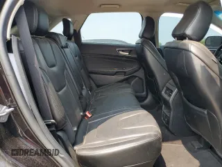 2020 Ford Edge Titanium z VIN 2FMPK4K97LBA56544, wystawiony jako Copart lot #59314005 z przebiegiem 84 861 mil mil oraz Czysty tytuł • Clean title. Historia ofert i sprzedaży dostępna na DreamBid. Obrazek 11.