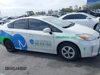 2015 Toyota Prius Four z VIN JTDKN3DU1F0445414, wystawiony jako IAAI lot #42342369 z przebiegiem 233 998 mil mil oraz . Historia ofert i sprzedaży dostępna na DreamBid. Obrazek 13.