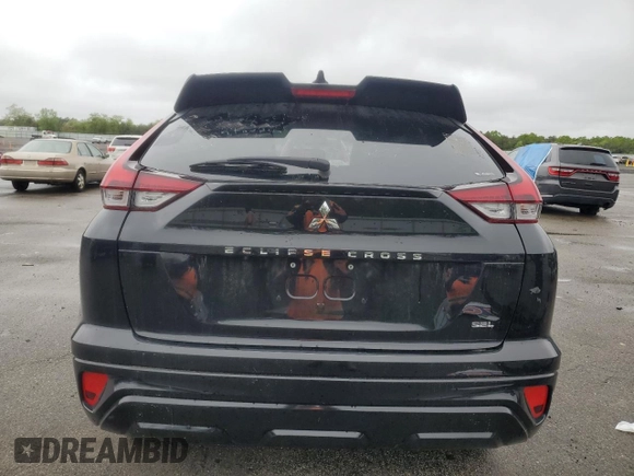 2024 Mitsubishi Eclipse Cross SE z VIN JA4ATWAA5RZ003601, wystawiony jako Copart lot #58672405 z przebiegiem 6 821 mil mil oraz Czysty tytuł • Clean title. Historia ofert i sprzedaży dostępna na DreamBid. Obrazek 6.