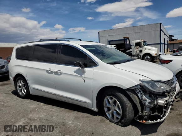 2017 Chrysler Pacifica Touring L Plus with VIN 2C4RC1EGXHR518841, listed as a Copart auction lot 54969455 with 130,902 mi miles and Clean Title. Bid and sale history available at DreamBid. Image 4.
