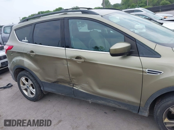 2013 Ford Escape SE with VIN 1FMCU9GX2DUC43098, listed as a IAAI auction lot 42687520 with 104,084 mi miles and . Bid and sale history available at DreamBid. Image 6.