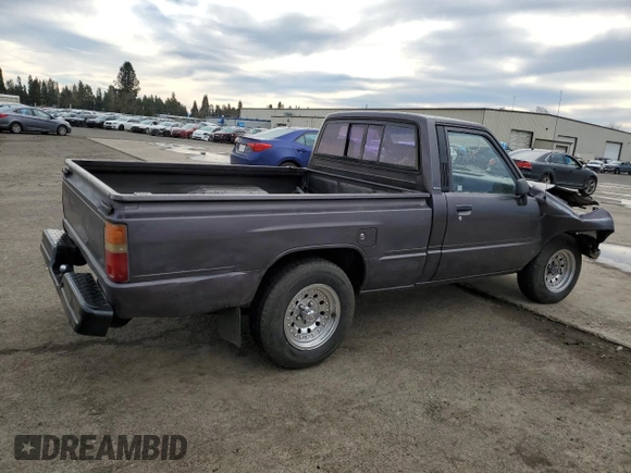 1988 Toyota Pickup z VIN JT4RN50R1J5149025, wystawiony jako Copart lot #41651215 z przebiegiem 263 997 mil mil oraz Szkoda całkowita • Salvage title. Historia ofert i sprzedaży dostępna na DreamBid. Obrazek 3.