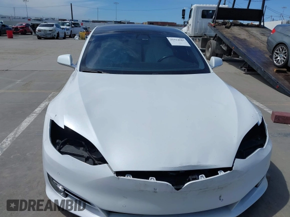 2018 Tesla Model S 75D with VIN 5YJSA1E25JF245269, listed as a IAAI auction lot 41914567 with 56,086 mi miles and . Bid and sale history available at DreamBid. Image 13.