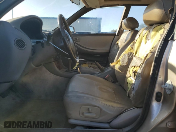 1995 Lexus ES 300 with VIN JT8GK13T6S0101694, listed as a Copart auction lot 77683754 with 247,984 mi miles and Salvage Title. Bid and sale history available at DreamBid. Image 7.