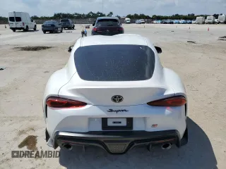 2025 Toyota GR Supra 3.0 with VIN WZ1DB0G09SW069188, listed as a Copart auction lot 49242215 with 0 mi miles and Salvage Title. Bid and sale history available at carsss.com. Image 6.