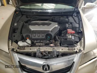 2009 Acura RL Technology z VIN JH4KB26699C002527, wystawiony jako Copart lot #54668255 z przebiegiem 143 644 mil mil oraz Szkoda całkowita • Salvage title. Historia ofert i sprzedaży dostępna na DreamBid. Obrazek 11.