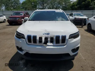 2019 Jeep Cherokee Latitude Plus with VIN 1C4PJMLX3KD251974, listed as a Copart auction lot 63378625 with 59,144 mi miles and Salvage title. Bid and sale history available at DreamBid. Image 5.