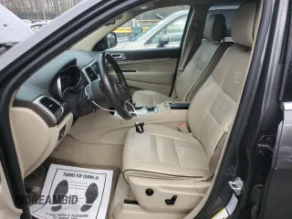 2015 Jeep Grand Cherokee Overland with VIN 1C4RJFCG0FC848046, listed as a Copart auction lot 49514795 with 212,688 mi miles and Clean title. Bid and sale history available at DreamBid. Image 7.