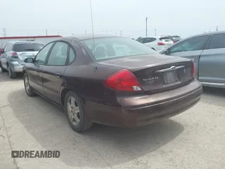 2000 Ford Taurus SEL z VIN 1FAFP56S2YA183814, wystawiony jako IAAI lot #42269148 z przebiegiem 210 990 mil mil oraz . Historia ofert i sprzedaży dostępna na DreamBid. Obrazek 3.
