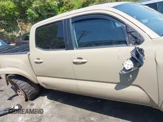 2017 Toyota Tacoma SR5 z VIN 3TMAZ5CN1HM026355, wystawiony jako IAAI lot #42060428 z przebiegiem 165 096 mil mil oraz . Historia ofert i sprzedaży dostępna na DreamBid. Obrazek 13.
