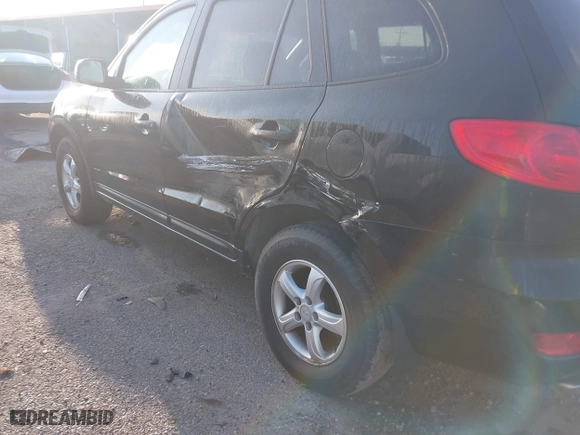 2007 Hyundai Santa Fe GLS with VIN 5NMSG13D67H052655, listed as a IAAI auction lot 41999808 with 163,423 mi miles. Bid and sale history available at carsss.com. Image 6.