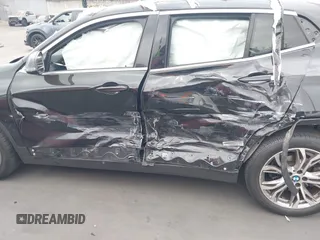 2019 BMW X2 sDrive28i with VIN WBXYJ3C58KEP77334, listed as a IAAI auction lot 42575165 with 98,910 mi miles and . Bid and sale history available at DreamBid. Image 6.