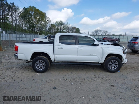 2017 Toyota Tacoma SR5 z VIN 3TMAZ5CN8HM045727, wystawiony jako IAAI lot #41962213 z przebiegiem 88 042 mil mil oraz . Historia ofert i sprzedaży dostępna na DreamBid. Obrazek 13.