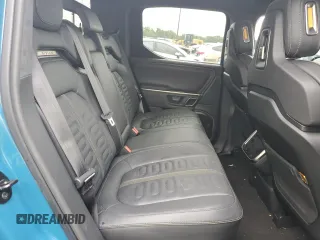 2023 Rivian R1T Adventure with VIN 7FCTGBAA5PN026063, listed as a Copart auction lot 66916194 with Not Provided miles and Salvage Title. Bid and sale history available at DreamBid. Image 10.