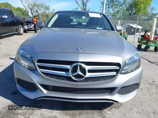 2016 Mercedes-Benz C 300 Luxury with VIN 55SWF4KB7GU138417, listed as a IAAI auction lot 41696331 with 90,879 mi miles and . Bid and sale history available at DreamBid. Image 13.