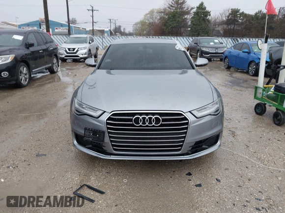 2016 Audi A6 2.0T Premium Plus with VIN WAUGFAFC1GN014536, listed as a IAAI auction lot 41937616 with 122,417 mi miles. Bid and sale history available at carsss.com. Image 12.