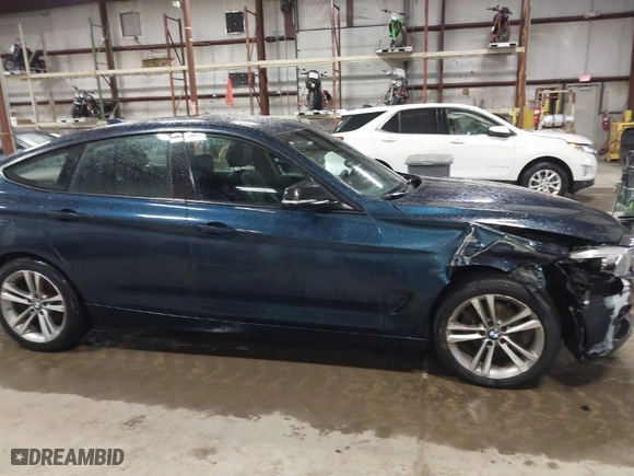 2014 BMW 3 Series Gran Turismo 328i xDrive with VIN WBA3X5C5XED557668, listed as a IAAI auction lot 41728522 with 123,393 mi miles. Bid and sale history available at carsss.com. Image 13.