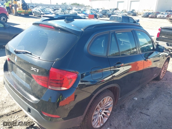 2013 BMW X1 28i with VIN WBAVM1C51DVW41977, listed as a IAAI auction lot 41607741 with 158,258 mi miles. Bid and sale history available at carsss.com. Image 4.