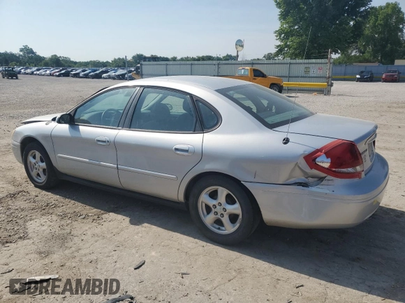 2004 Ford Taurus SE with VIN 1FAFP53U04G133586, listed as a Copart auction lot 59972925 with 228,938 mi miles and Salvage title. Bid and sale history available at DreamBid. Image 2.