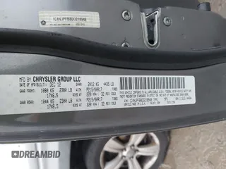 2013 Jeep Patriot Latitude with VIN 1C4NJPFB8DD218948, listed as a IAAI auction lot 41072937 with 126,140 mi miles and . Bid and sale history available at carsss.com. Image 9.