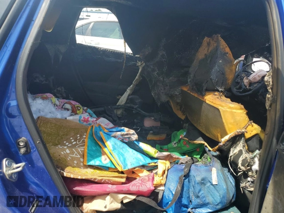 2019 Honda Fit LX z VIN 3HGGK5H42KM742124, wystawiony jako Copart lot #57174335 z przebiegiem Nie podano mil oraz Nie do naprawy • Non repairable. Historia ofert i sprzedaży dostępna na DreamBid. Obrazek 10.