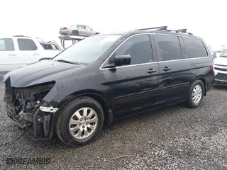 2009 Honda Odyssey EX-L with VIN 5FNRL38709B034326, listed as a IAAI auction lot 41291489 with NaN miles. Bid and sale history available at carsss.com. Image 18.