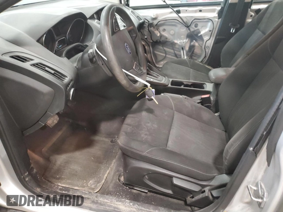 2018 Ford Focus SE z VIN 1FADP3F24JL315154, wystawiony jako Copart lot #53609185 z przebiegiem 76 216 mil mil oraz Szkoda całkowita • Salvage title. Historia ofert i sprzedaży dostępna na DreamBid. Obrazek 7.