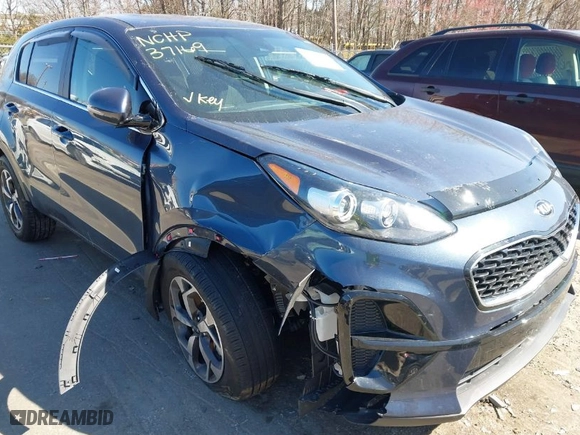 2021 Kia Sportage LX with VIN KNDPM3AC8M7855720, listed as a IAAI auction lot 41772936 with 17,071 mi miles. Bid and sale history available at carsss.com. Image 6.