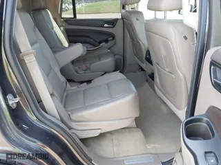 2015 Chevrolet Tahoe LTZ with VIN 1GNSKCKC3FR640615, listed as a IAAI auction lot 40843080 with 142,445 mi miles. Bid and sale history available at carsss.com. Image 8.