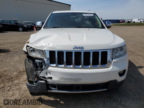 2011 Jeep Grand Cherokee Overland with VIN 1J4RR6GG3BC718723, listed as a Copart auction lot 64975275 with 272,922 mi miles and Salvage title. Bid and sale history available at DreamBid. Image 5.