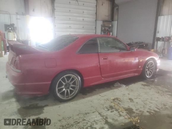 1997 Nissan Skyline z VIN BCNR33042682, wystawiony jako Copart lot #76562674 z przebiegiem 61 791 mil mil oraz Czysty tytuł • Clean title. Historia ofert i sprzedaży dostępna na DreamBid. Obrazek 3.