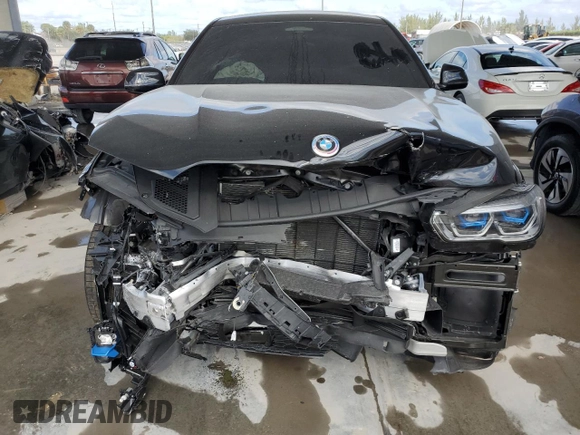 2023 BMW X6 M50i with VIN 5UXCY8C01P9S00552, listed as a Copart auction lot 84193154 with 16,590 mi miles and Salvage Title. Bid and sale history available at carsss.com. Image 5.
