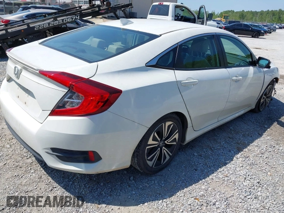 2018 Honda Civic EX-L with VIN 19XFC1F72JE002269, listed as a IAAI auction lot 41973885 with 130,979 mi miles and . Bid and sale history available at DreamBid. Image 4.